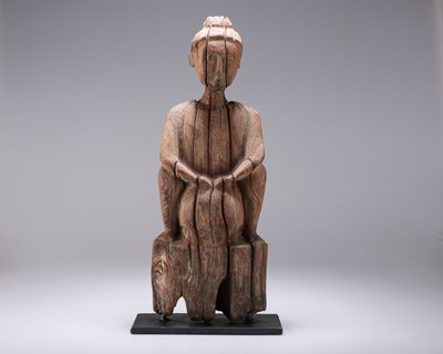 Lot 10 - A CARVED WOODEN FIGURE