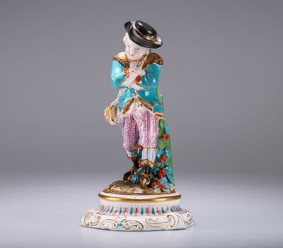 Lot 83 - A CONTINENTAL PORCELAIN FIGURE OF A BOY, CIRCA 1900