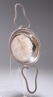 Lot 367 - A GEORGE III SILVER LEMON STRAINER