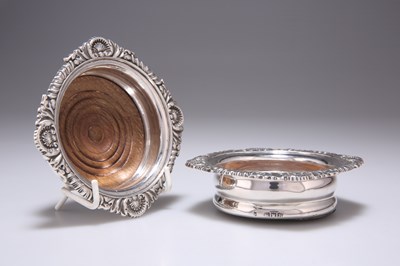 Lot 351 - A PAIR OF VICTORIAN SILVER COASTERS