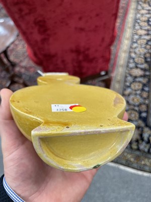 Lot 126 - A CHINESE MUSTARD-GLAZED WALL POCKET