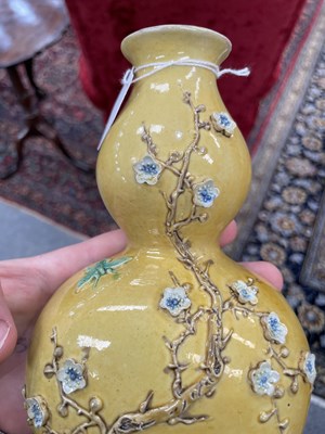 Lot 126 - A CHINESE MUSTARD-GLAZED WALL POCKET