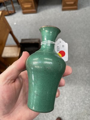 Lot 108 - A CHINESE GREEN CRACKLE GLAZE SMALL VASE