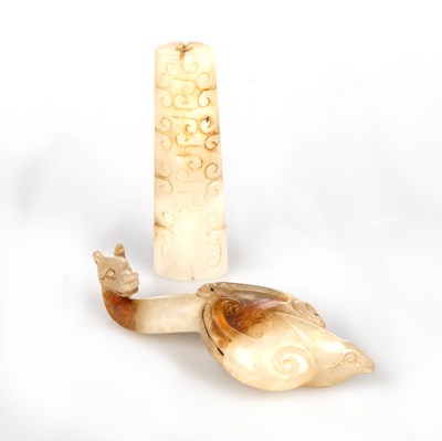 Lot 131 - A CHINESE JADE PLUME HOLDER AND A JADE 'BIRD' BELT HOOK