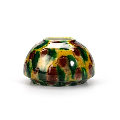 Lot 112 - A CHINESE SANCAI-GLAZED WATER POT