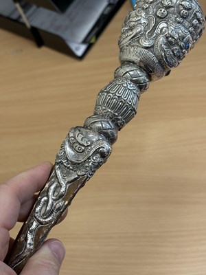 Lot 306 - A TIBETAN SILVER-MOUNTED PHURBA