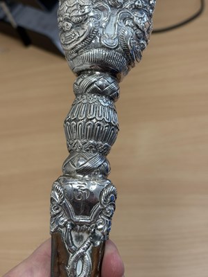 Lot 306 - A TIBETAN SILVER-MOUNTED PHURBA