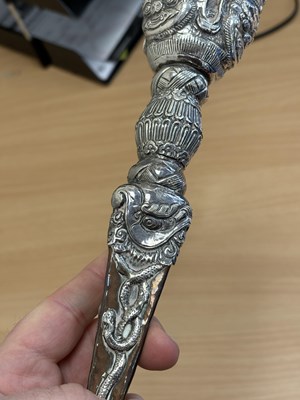 Lot 306 - A TIBETAN SILVER-MOUNTED PHURBA