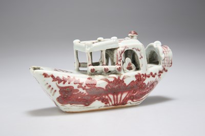 Lot 111 - A CHINESE UNDERGLAZE RED AND WHITE PORCELAIN WATER DROPPER, KANGXI/ YONGZHENG PERIOD