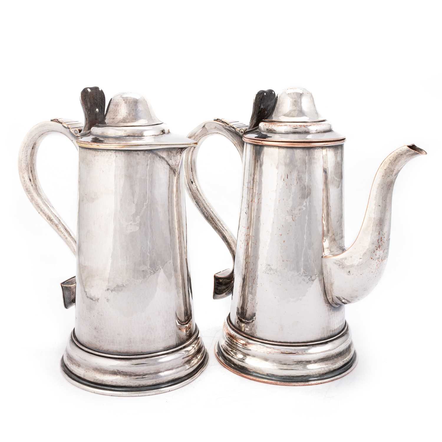 Lot 268 - AN ARTS AND CRAFTS SILVER-PLATE ON COPPER COFFEE POT AND FLAGON