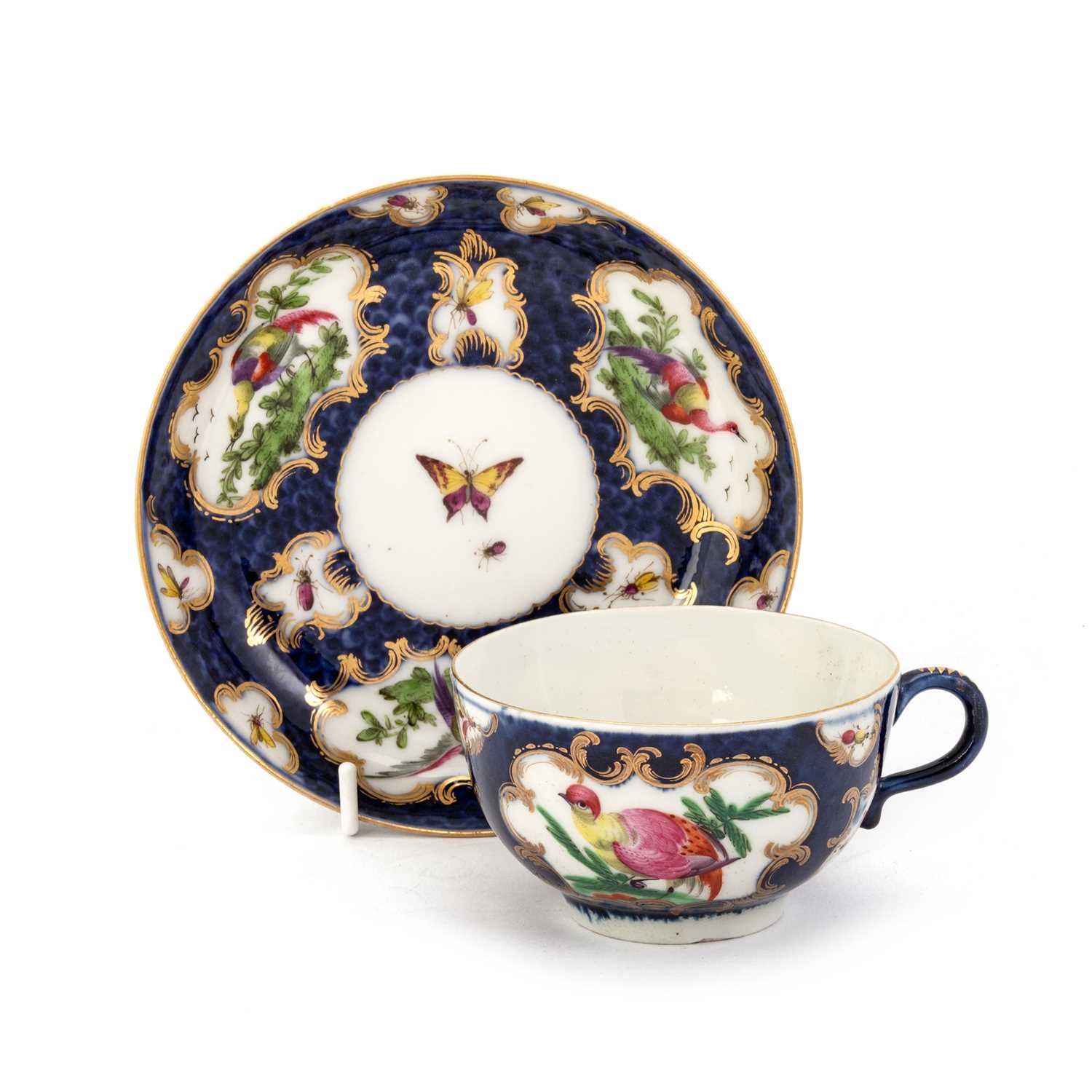 Lot 42 - A WORCESTER FACTORY-DECORATED BLUE SCALE CUP AND SAUCER, CIRCA 1770