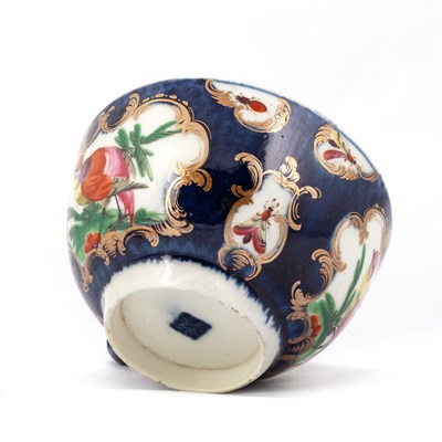 Lot 42 - A WORCESTER FACTORY-DECORATED BLUE SCALE CUP AND SAUCER, CIRCA 1770