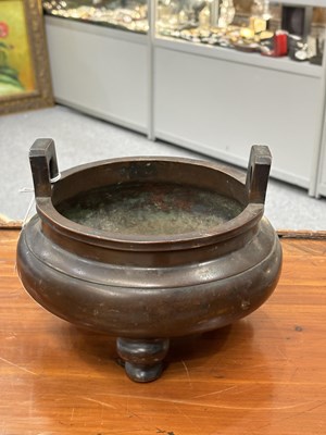 Lot 217 - A LARGE CHINESE BRONZE TRIPOD CENSER