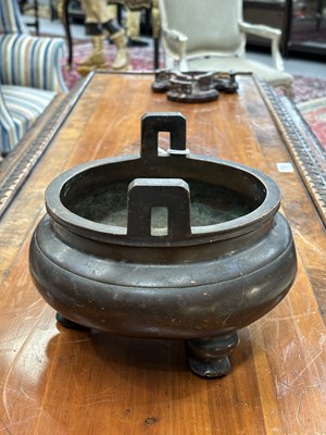 Lot 217 - A LARGE CHINESE BRONZE TRIPOD CENSER