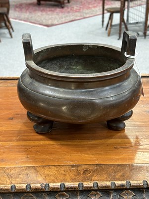 Lot 217 - A LARGE CHINESE BRONZE TRIPOD CENSER