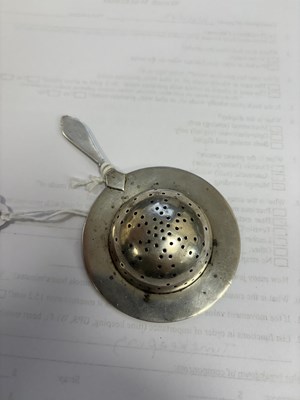 Lot 339 - A NORWEGIAN SILVER AND ENAMEL TEA STRAINER