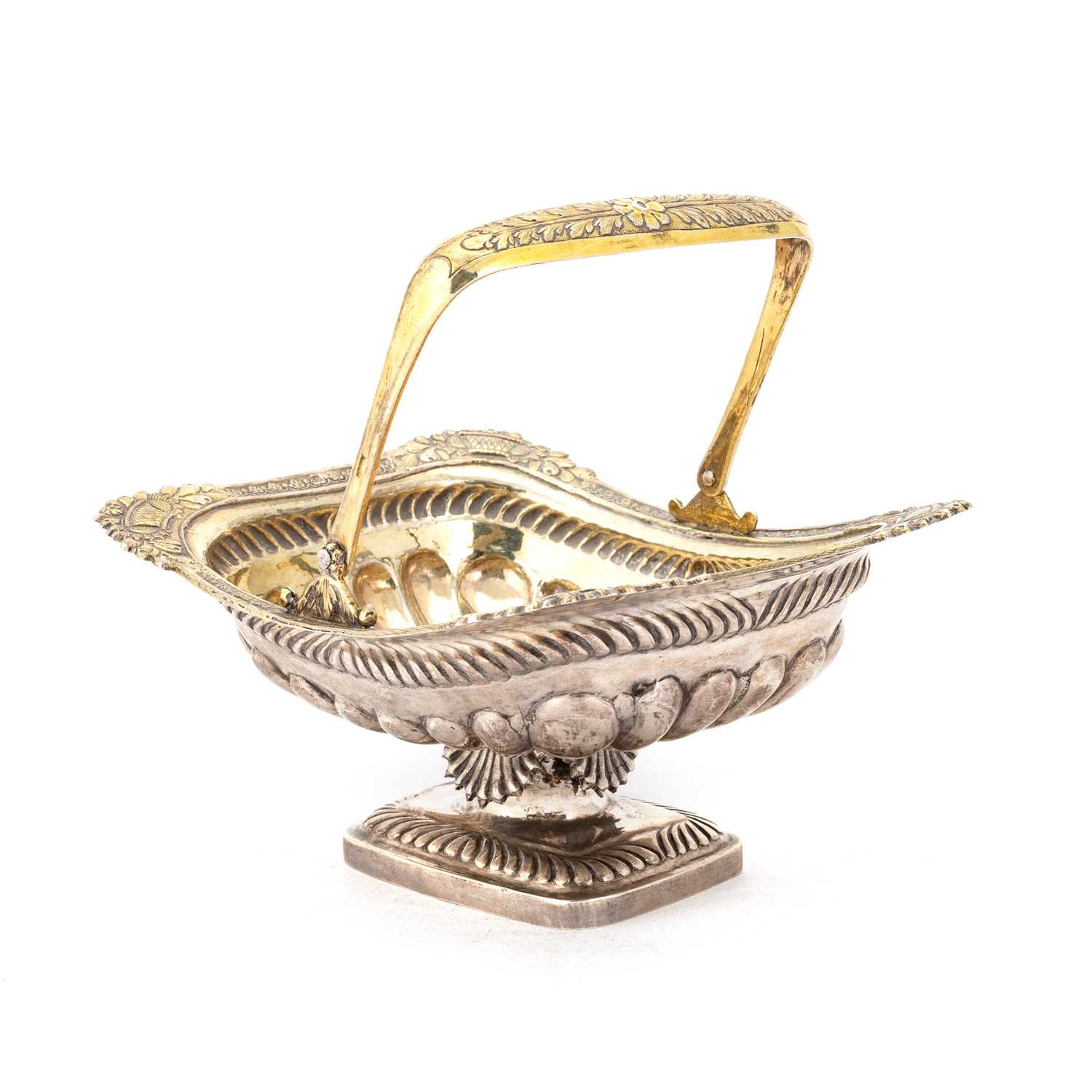 Lot 337 - A 19TH CENTURY RUSSIAN SILVER-GILT SWING-HANDLE BASKET