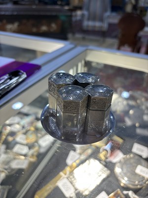 Lot 307 - A PERSIAN SILVER FOUR-PIECE CONDIMENT SET ON STAND, LATE 19TH CENTURY