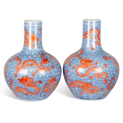 Lot 100 - A LARGE PAIR OF CHINESE UNDERGLAZE BLUE AND IRON-RED DRAGON VASES, TIANQIUPING