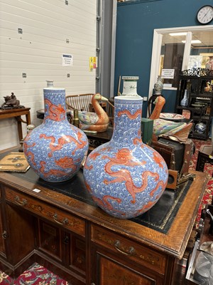 Lot 100 - A LARGE PAIR OF CHINESE UNDERGLAZE BLUE AND IRON-RED DRAGON VASES, TIANQIUPING