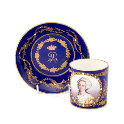 Lot 53 - A SÈVRES STYLE 'JEWELLED' CABINET CUP AND SAUCER, CIRCA 1870