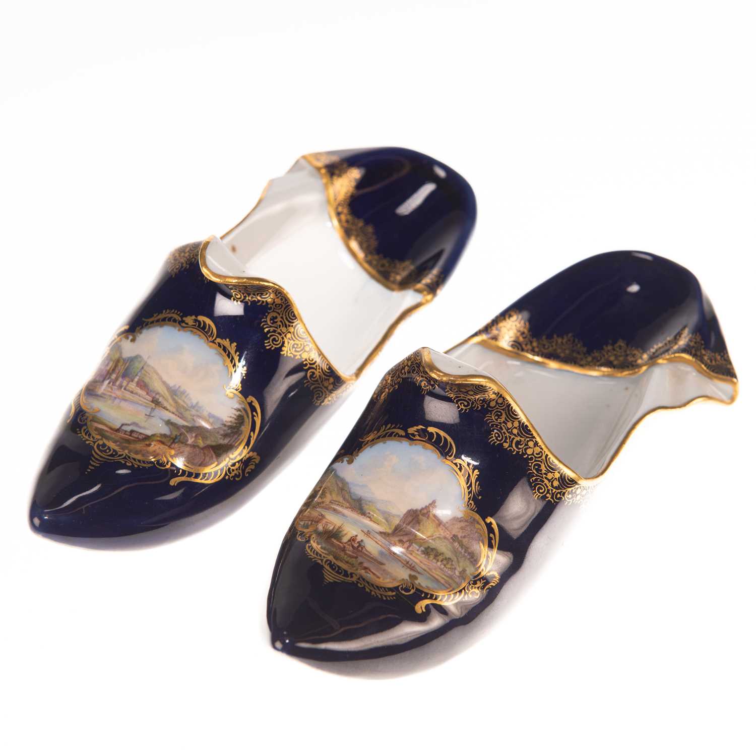 Lot 73 - A PAIR OF MEISSEN BLUE-GROUND MODELS OF SLIPPERS