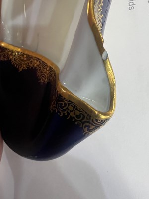 Lot 73 - A PAIR OF MEISSEN BLUE-GROUND MODELS OF SLIPPERS