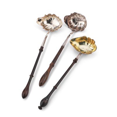Lot 239 - THREE GEORGE II SILVER TODDY LADLES