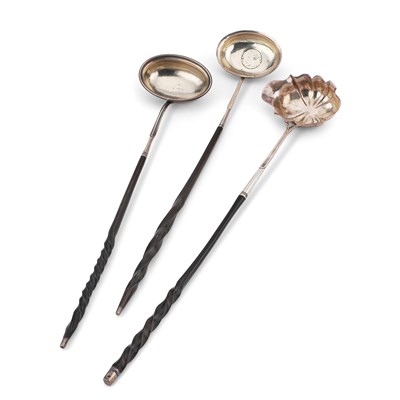 Lot 245 - THREE 18TH CENTURY SILVER TODDY LADLES