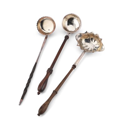 Lot 233 - THREE 18TH CENTURY SILVER TODDY LADLES