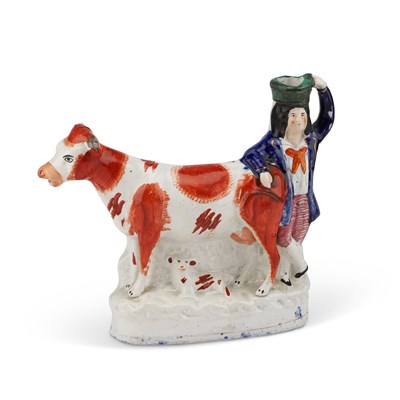 Lot 107 - A 19TH CENTURY STAFFORDSHIRE COW CREAMER