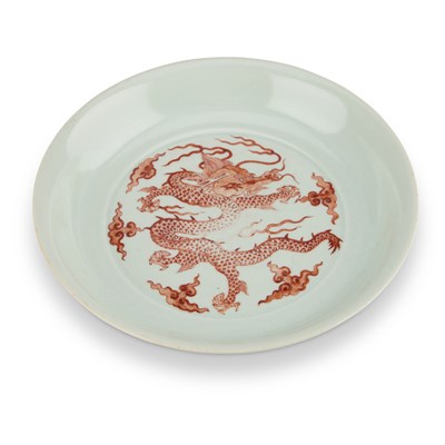 Lot 187 - A CHINESE CELADON-BACK IRON-RED 'DRAGON' DISH