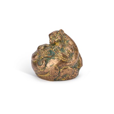Lot 124 - A CHINESE GILT-BRONZE SCROLL WEIGHT