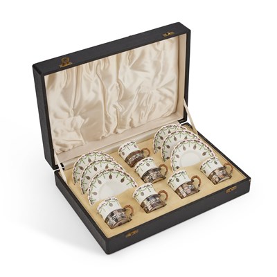 Lot 79 - A CASED SET OF SIX ROYAL WORCESTER SILVER-MOUNTED COFFEE CANS AND SAUCERS