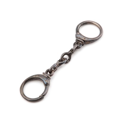 Lot 188 - AN ELIZABETH II SILVER NOVELTY KEYRING