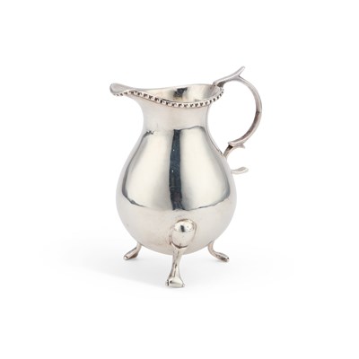 Lot 200 - AN 18TH CENTURY RUSSIAN SILVER CREAM JUG