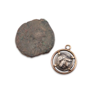 Lot 13 - JUSTINIAN I, BYZANTINE EMPIRE (527-265 A.D.), A BRONZE FOLLIS