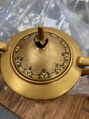 Lot 222 - A ROYAL WORCESTER GILDED TWO-HANDED CUP AND COVER