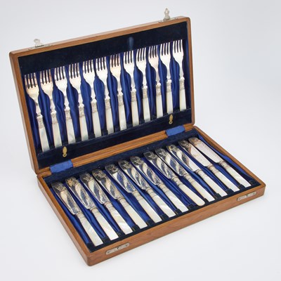 Lot 136 - A SET OF FOUR ENGLISH AESTHETIC MOVEMENT SILVER-PLATED SERVING SPOONS
