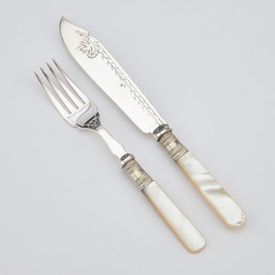 Lot 136 - A SET OF FOUR ENGLISH AESTHETIC MOVEMENT SILVER-PLATED SERVING SPOONS