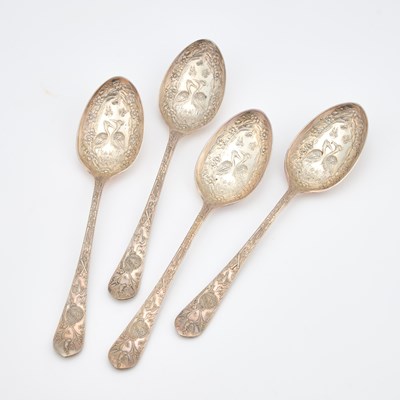 Lot 136 - A SET OF FOUR ENGLISH AESTHETIC MOVEMENT SILVER-PLATED SERVING SPOONS