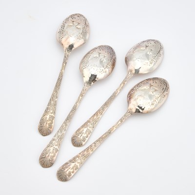 Lot 136 - A SET OF FOUR ENGLISH AESTHETIC MOVEMENT SILVER-PLATED SERVING SPOONS
