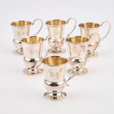 Lot 265 - A SET OF SIX GEORGE V SILVER TOT CUPS