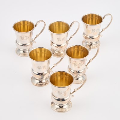 Lot 265 - A SET OF SIX GEORGE V SILVER TOT CUPS