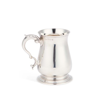 Lot 244 - A GEORGIAN STYLE SILVER MUG