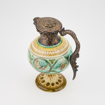 Lot 34 - A VICTORIAN SILVER-MOUNTED DELLA ROBBIA EWER