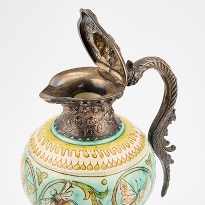 Lot 34 - A VICTORIAN SILVER-MOUNTED DELLA ROBBIA EWER