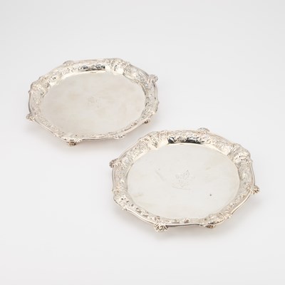 Lot 404 - A PAIR OF GEORGE II SILVER SALVERS