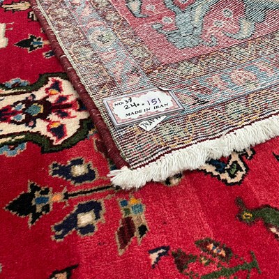 Lot 1231 - A PERSIAN LILLIAN CARPET, CIRCA 1960