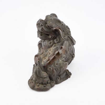 Lot 96 - A CHINESE BRONZE MODEL OF A BUDDHIST LION, 19TH CENTURY
